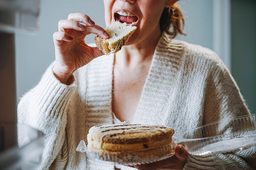 Woman eating cake